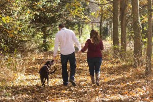 family, walking, woods, animal, fall, autumn, family with dog, path in the woods, family walking, family walking in woods, holding hands, pet, dog family, dog, brown dog, brown walking, brown path